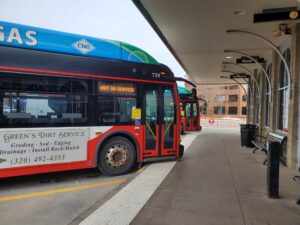 Picture of Metro Bus fixed route buses waiting at the Metro Bus Transit Center in downtown St. Cloud, MN
