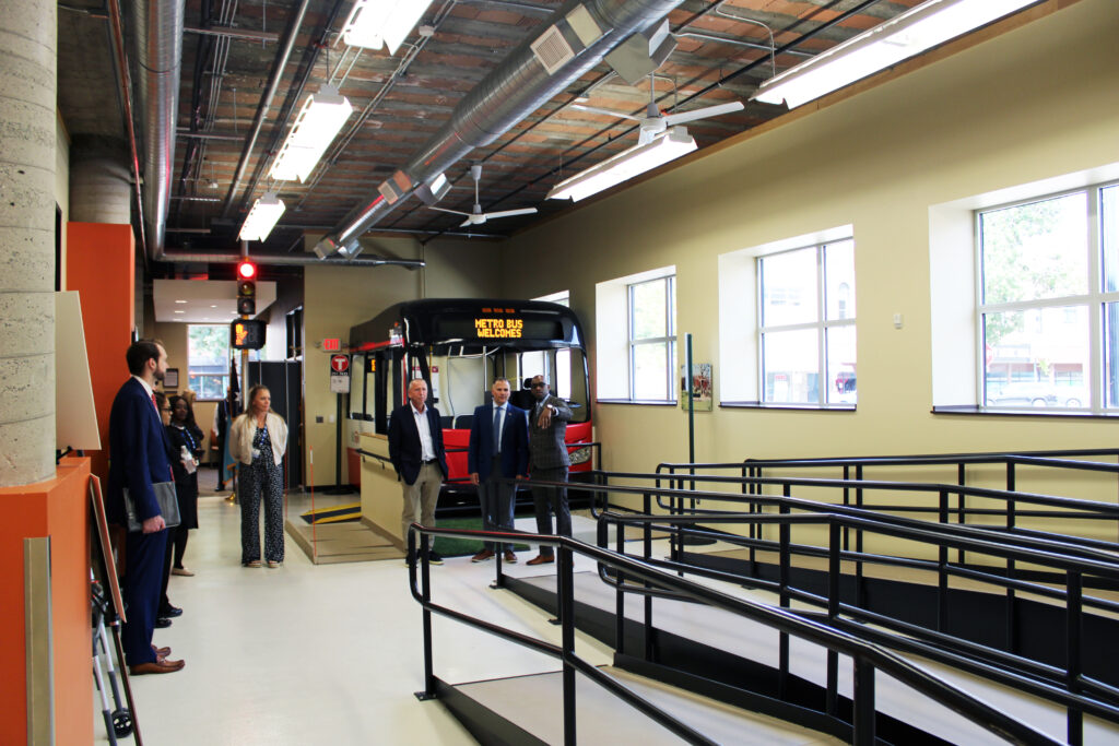Group touring the Metro Bus Mobility Training Center, St. Cloud, August 14, 2025.
